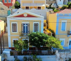 a house on the side of a hill at Pitini Sevasti house in Symi