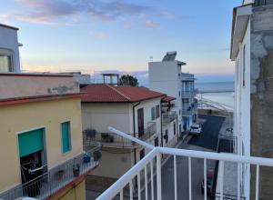 a view from a balcony of some buildings at Appartamento Ponente in Balestrate