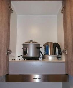 Η κουζίνα ή μικρή κουζίνα στο StayInMyCondo - 8th Condo in Pasay near NAIA Airport, MOA Pasay