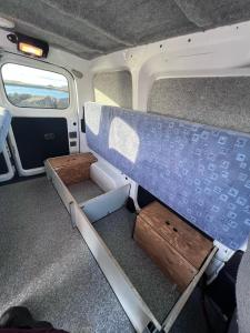 a view of the inside of a van with a bench at Cheap Camper Van in Iceland in Reykjavík