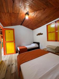 Postel nebo postele na pokoji v ubytování Hospedaje Campestre El Rancho de Jero + 19 fotografií