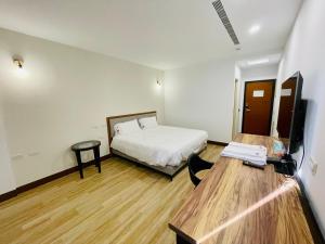 Krevet ili kreveti u jedinici u objektu 浯島文旅WD Hotel