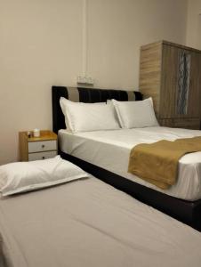 Giường trong phòng chung tại 822TaipingHomestay