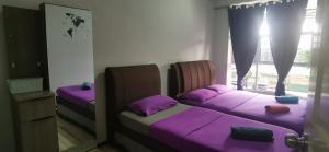 Postel nebo postele na pokoji v ubytování Zero Gravity Homestay 零重力民宿