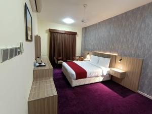 Letto o letti in una camera di ROYAL HOTEL