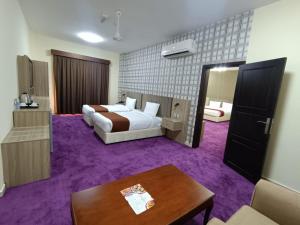 Letto o letti in una camera di ROYAL HOTEL