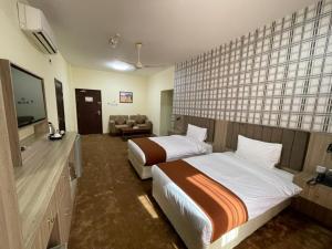 Letto o letti in una camera di ROYAL HOTEL