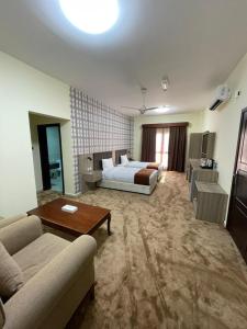 Letto o letti in una camera di ROYAL HOTEL