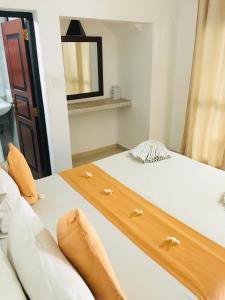 Voodi või voodid majutusasutuse Janus Paradise Rest toas