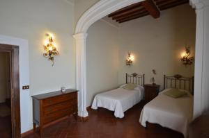 Posteľ alebo postele v izbe v ubytovaní Wonderful villa in Montepulciano