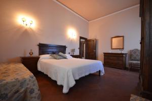 Posteľ alebo postele v izbe v ubytovaní Wonderful villa in Montepulciano