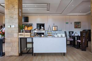 Příslušenství pro přípravu čaje a kávy v ubytování The Nest Boutique Hotel