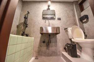 Koupelna v ubytování Eryang Homestay