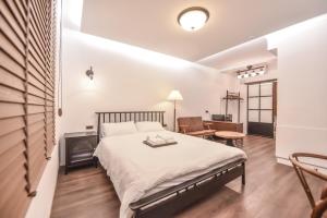 Postel nebo postele na pokoji v ubytování Eryang Homestay