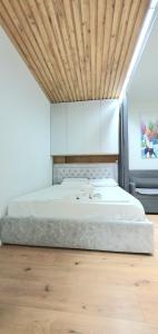 Кровать или кровати в номере Avalona Apartment 2