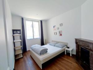 Postel nebo postele na pokoji v ubytování Appartement hyper centre de Montargis