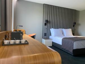 Letto o letti in una camera di HABAKUK Wellness & Event Hotel
