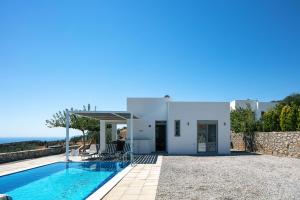 The swimming pool at or close to Evgoro Luxury Suites