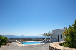 The swimming pool at or close to Evgoro Luxury Suites