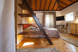 Cama ou camas em um quarto em Hotel Casa da Nora