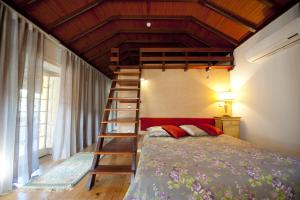 Cama ou camas em um quarto em Hotel Casa da Nora
