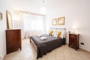 Posteľ alebo postele v izbe v ubytovaní Liala Home