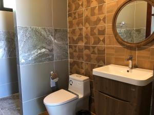 Koupelna v ubytování Likita Resort