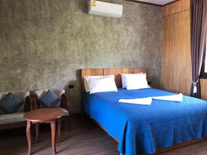 Postel nebo postele na pokoji v ubytování Likita Resort