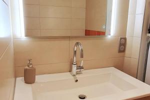 Koupelna v ubytování Le 56 Faubourg - Proche centre - Parking gratuit + 1 fotografie