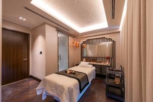 Кровать или кровати в номере Shaza Doha