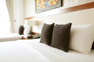 Postel nebo postele na pokoji v ubytování Starlet Hotel