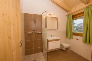 Kúpeľňa v ubytovaní Penthousewohnung mit Garten Sauna Pool
