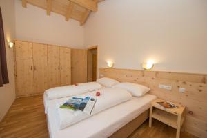 Posteľ alebo postele v izbe v ubytovaní Penthousewohnung mit Garten Sauna Pool