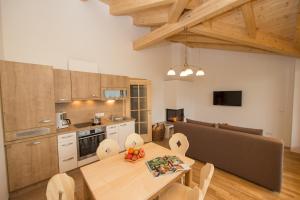 Kuchyň nebo kuchyňský kout v ubytování Penthousewohnung mit Garten Sauna Pool
