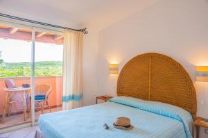 Кровать или кровати в номере Residence Fenicia