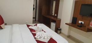 TV a/nebo společenská místnost v ubytování Hotel MK Grand