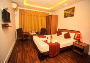 Krevet ili kreveti u jedinici u okviru objekta Thamel Grand Hotel