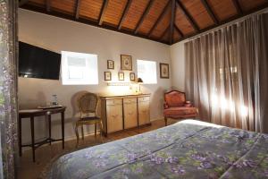 Cama ou camas em um quarto em Hotel Casa da Nora