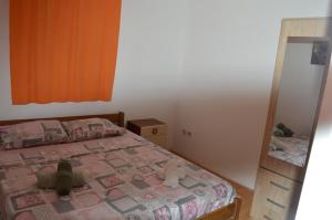 Postel nebo postele na pokoji v ubytování Apartman Didi