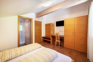Posteľ alebo postele v izbe v ubytovaní Ferienwohnung Edelweiss
