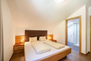 Posteľ alebo postele v izbe v ubytovaní Ferienwohnung Edelweiss