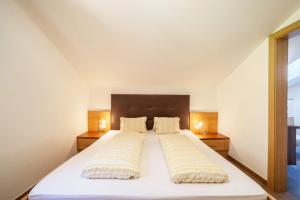 Posteľ alebo postele v izbe v ubytovaní Ferienwohnung Edelweiss