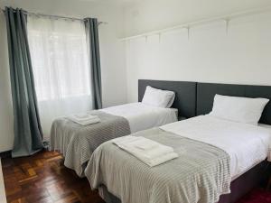 เตียงในห้องที่ Remarkable 2-Bed House in Bulawayo