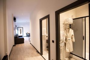 a dressing room with a mannequin in a window at Cityloft 161 in Istanbul