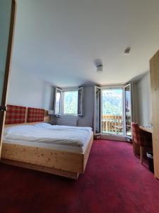 Letto o letti in una camera di Hotel Strandhotel