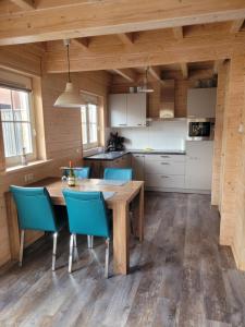 Kuchyň nebo kuchyňský kout v ubytování Vakantiewoning Zeeduinsepoort 14A met sauna