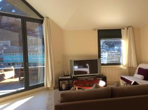 Μια τηλεόραση ή/και κέντρο ψυχαγωγίας στο Outdoor Apartaments - Comfort