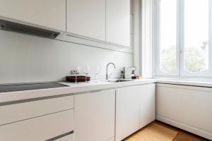 A kitchen or kitchenette at Fifty Eight Suite Milan Santo Stefano