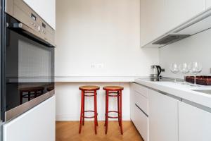 A kitchen or kitchenette at Fifty Eight Suite Milan Santo Stefano