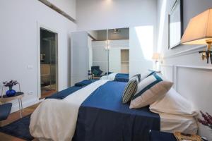 Posteľ alebo postele v izbe v ubytovaní Apartments Florence - Angel's Loft